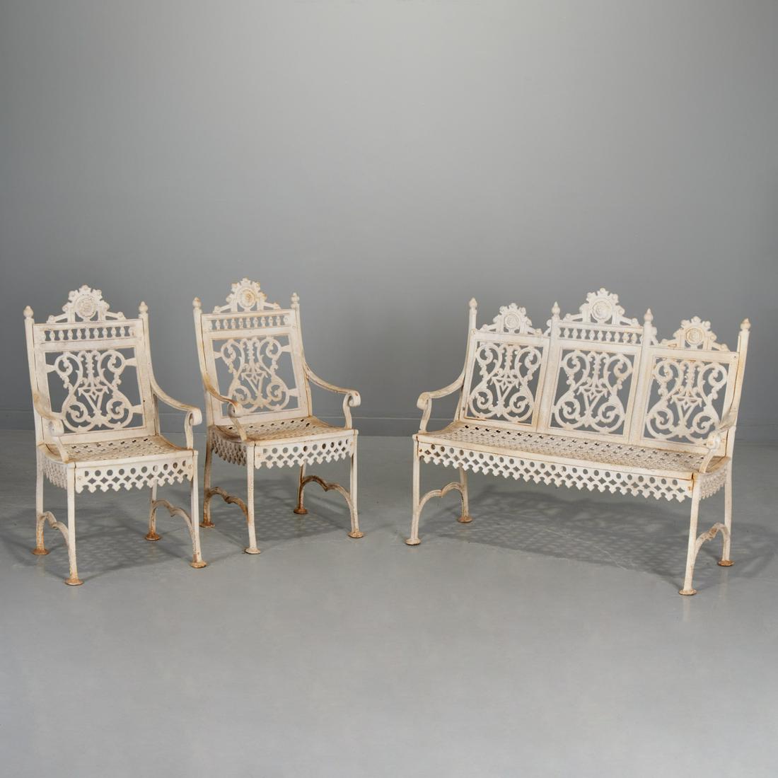 American cast iron garden seating group: American cast iron garden seating group, Late 19th c. or later, white painted cast iron, neoclassical pattern, including (1) bench, and (2) chairs, attributed to John McLean, New York, 36"h x 44"l x 1