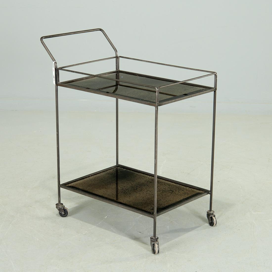 Mid-Century Modern style smoked glass bar cart: Mid-Century Modern style smoked glass bar cart, 21st c., dark patinated metal trolley with tow tiers of faux oxidized beveled glass, on casters, unmarked, 36.5"h Provenance: A Private Collection: 374 