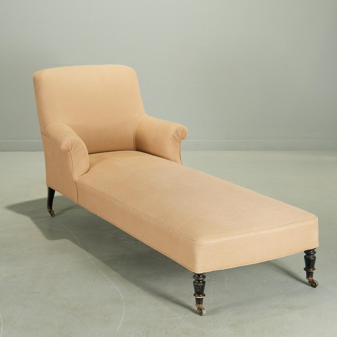 Edwardian upholstered chaise lounge: Edwardian upholstered chaise lounge, Late 19th/20th c., with chair back, scrolled arms, on turned wood legs, ending on casters, with later custom upholstery in neutral fabric, unmarked, approx. 36"h x