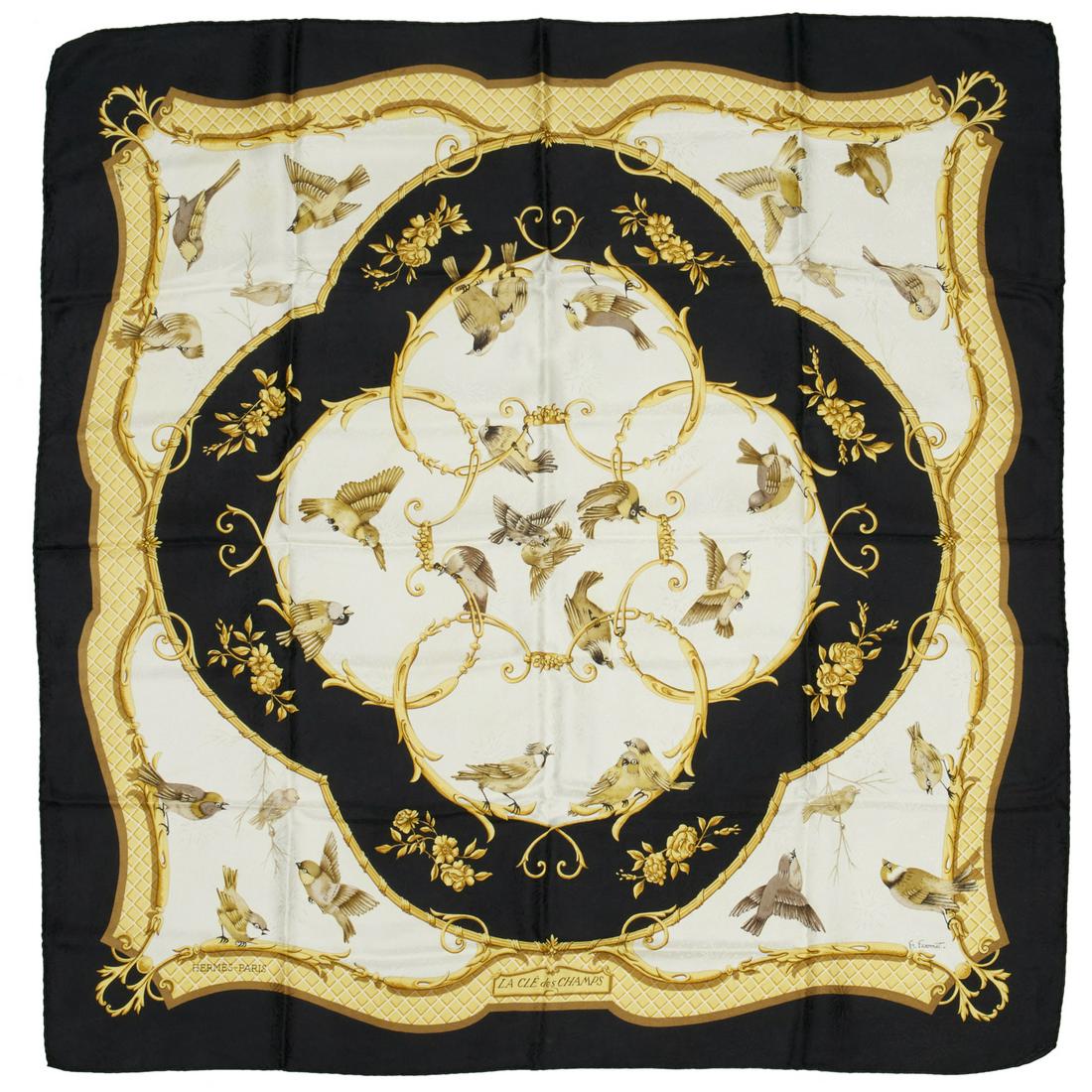 Hermes "Cle des Champs" 90 cm silk scarf: Hermes "Cle des Champs" 90 cm silk scarf, 20th c., Made in Italy, black, with gold, bird motif, first designed by FranÃ§oise FaÃ§onnet in 1965, 35" sq. Provenance: From an Upper East Side Collecti