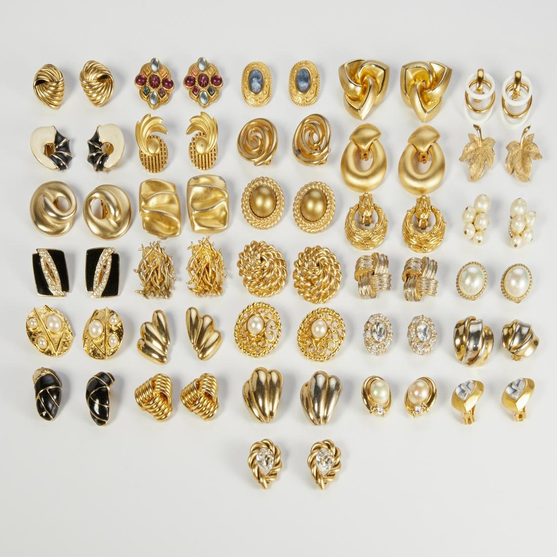 Group of gold tone costume jewelry earrings: Group of gold tone costume jewelry earrings, 20th c., 30+ pair, including Hattie Carnegie, Diva, Ciner, Jaded, Trifari, St. John, many unmarked