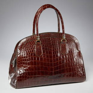 Morabito Paris crocodile satchel handbag: Morabito Paris crocodile satchel handbag, 20th c., Made in France, brown leather, top zip, (2) handle style, interior with (2) pockets, approx. 10"h x 15"w Provenance: From an Upper East Side