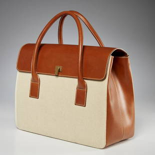 Lambertson Truex leather & linen boxcar handbag: Lambertson Truex leather & linen boxcar handbag, 21st c., Made in Italy, camel leather with sand linen canvas, classic style launched in 1998 with top handle, flap with flip lock closure, suede interi