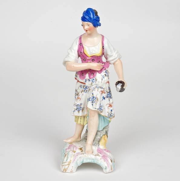 KPM porcelain figure of a Bar Maid: KPM porcelain figure of a Bar Maid, 19th c., underglaze blue factory mark, 9"h x 3.75"w Provenance: The Virginia Museum of Fine Art