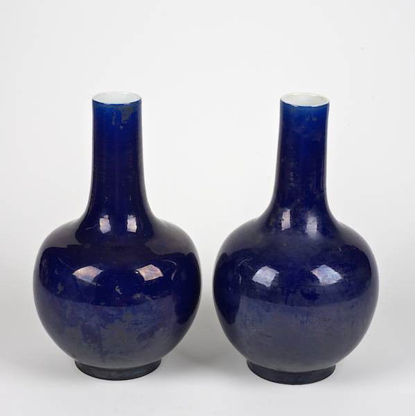 Pair Chinese cobalt blue porcelain bottle vases: Pair Chinese cobalt blue porcelain bottle vases, Prob. Republic Period, bearing Yongzheng marks, 13.5"h x 7.75"dia.