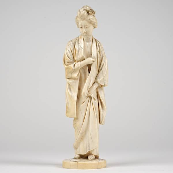 Antique Japanese carved ivory figure of a concubi: Antique Japanese carved ivory figure of a concubine, Meiji Period, nicely modeled, artist-signed, 14"h x 4"w
