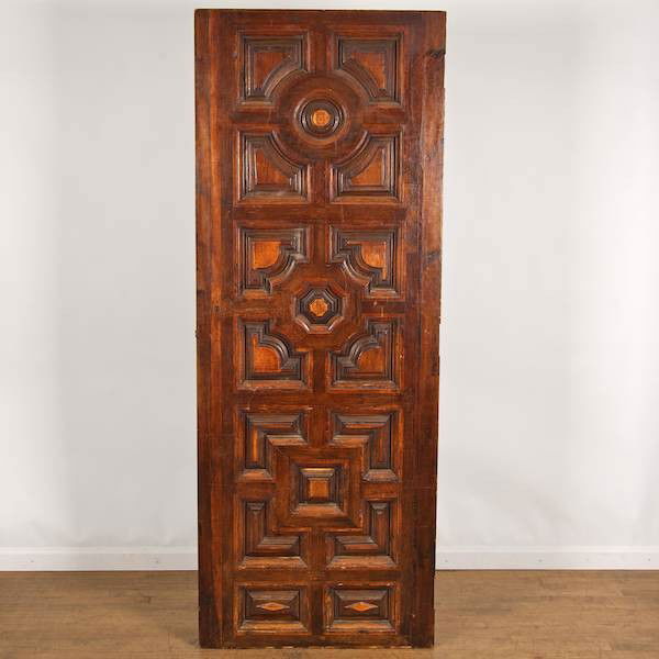Antique Continental paneled walnut door: Antique Continental paneled walnut door, 18th c., probably Spanish or Italian, 79.5"h x 29.5"w Provenance: The Estate of Amy Perlin, NY