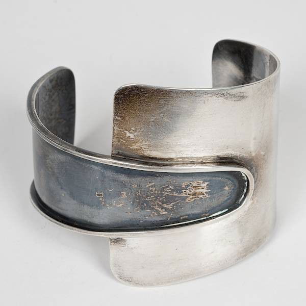 Modernist sterling cuff bracelet by Ed Wiener: Modernist sterling cuff bracelet by Ed Wiener, Mid 20th c., signed "ED WIENER STERLING", 2.5"l x 2.25"w, approx. 1.8 ozt.