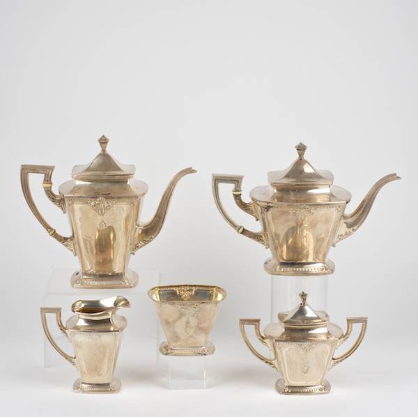 International Trianon pattern sterling tea/coffee: International Trianon pattern sterling tea/coffee set, 20th c., incl. (1) coffee pot; (1) teapot; (1) sugar bowl; (1) cream jug and (1) waste bowl, 10"h x 11.5"l (coffee pot), approx. 82.7 ozt. Proven