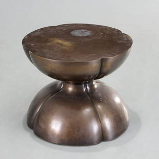 Jacques Garcia, bronze 'Lucky' side table: Jacques Garcia, bronze 'Lucky' side table, 21st c., USA, brown patinated heavy cast bronze, McGuire, San Francisco label to underside, 18"h x 22"dia Provenance: Property from the Collection of a Media