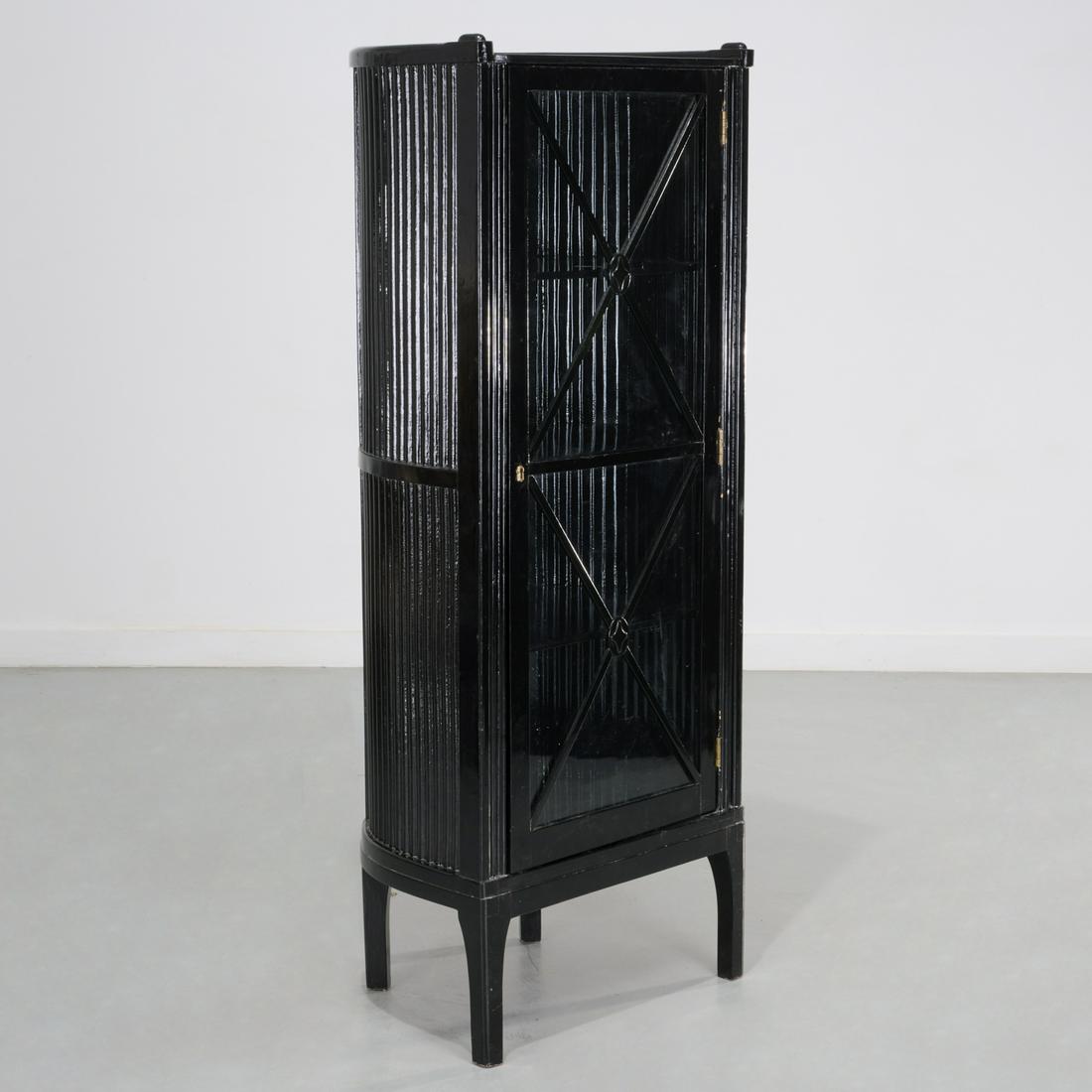 Hans Gunther Reinstein, glass-front vitrine: Hans Gunther Reinstein, glass-front vitrine, c. 1911, Germany, black lacquered wood, the barrel back comprised of stacked dowels terminating in a curved bentwood base raised on tall square legs, front