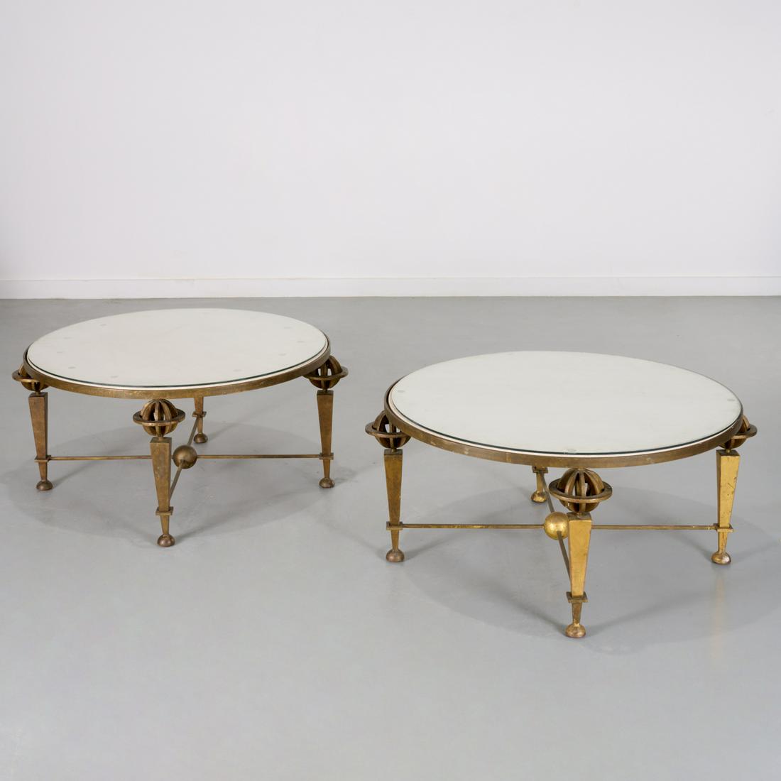 Andre Arbus (manner), pair gilt iron gueridons: Andre Arbus (manner), pair gilt iron gueridons, c. 1940s, France, the round tabletops inset with cast poured stone topped with glass, raised on four armillary globes above pyramidal legs joined by str