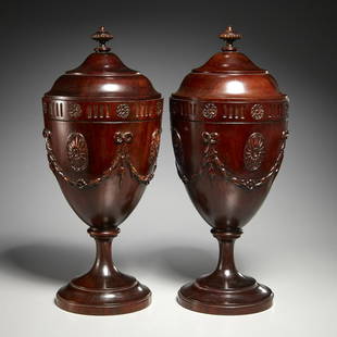 Pair George III style mahogany knife urns: Pair George III style mahogany knife urns, 19th/20th c., England, in the manner of Thomas Sheraton, decorated with flowerhead roundels and bellflower swags, on tiered round foot, the domed lid with tu