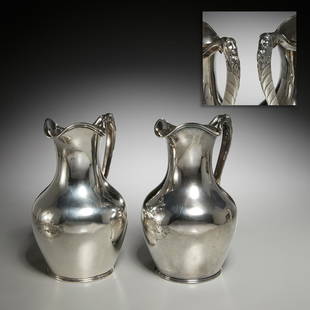 William Forbes, (2) coin silver pitchers: William Forbes, (2) coin silver pitchers, c. 1875, New York, each of baluster form with shaped handle topped with a satyr mask, touch mark to underside, retailed by Ball, Tompkins & Black, New York, N