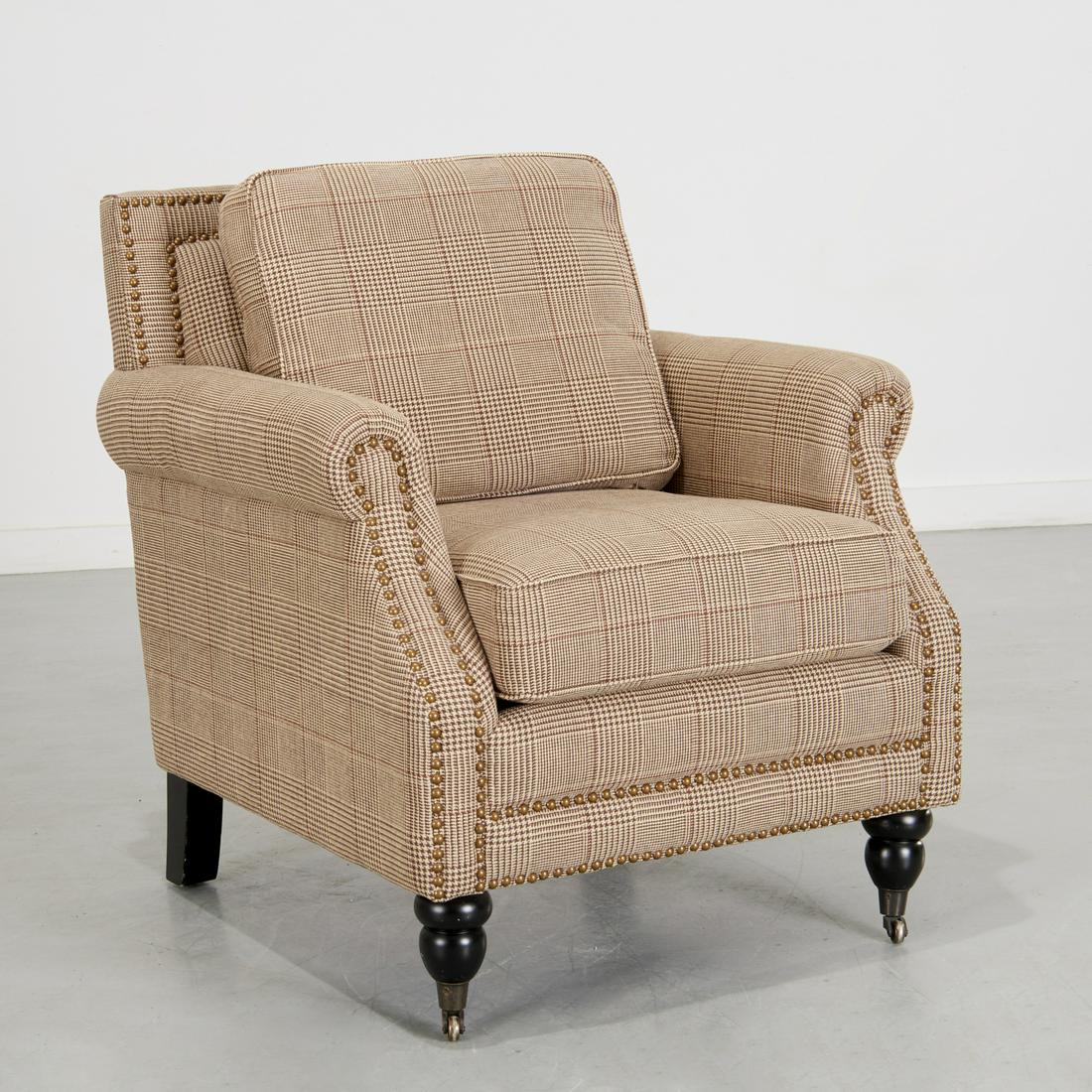 Houndstooth upholstered library chair: Houndstooth upholstered library chair, 21st c., good quality, square back upholstered club chair with nail head trim on baluster legs, ending on casters, unmarked, 34"h x 29.25"w x 33"d