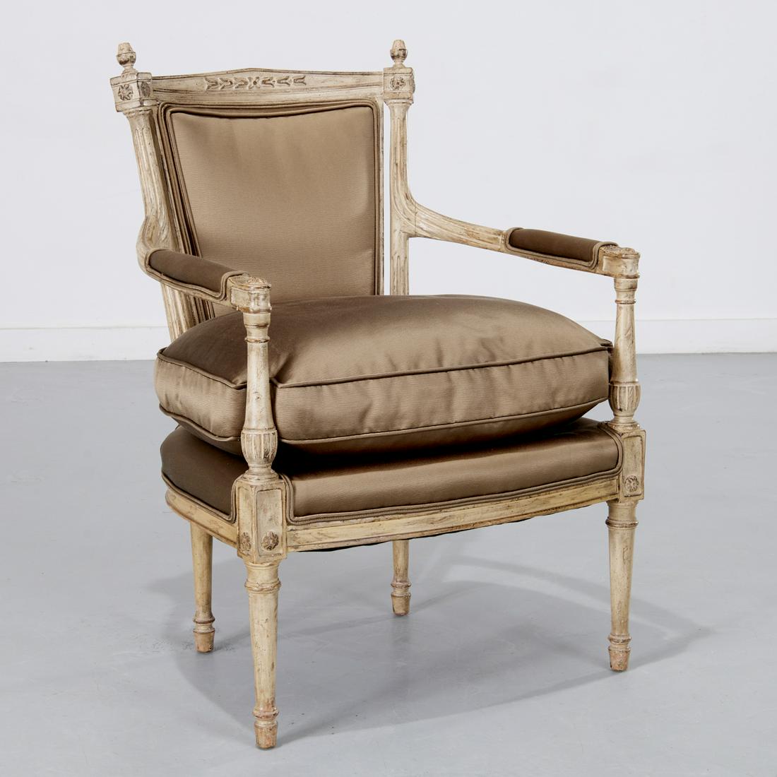 Nice Louis XVI style upholstered fauteuil: Nice Louis XVI style upholstered fauteuil, 20th c., cream painted frame and down filled, unmarked, 35.75"h x 25"w x 19"d, 21.5"h (to seat)