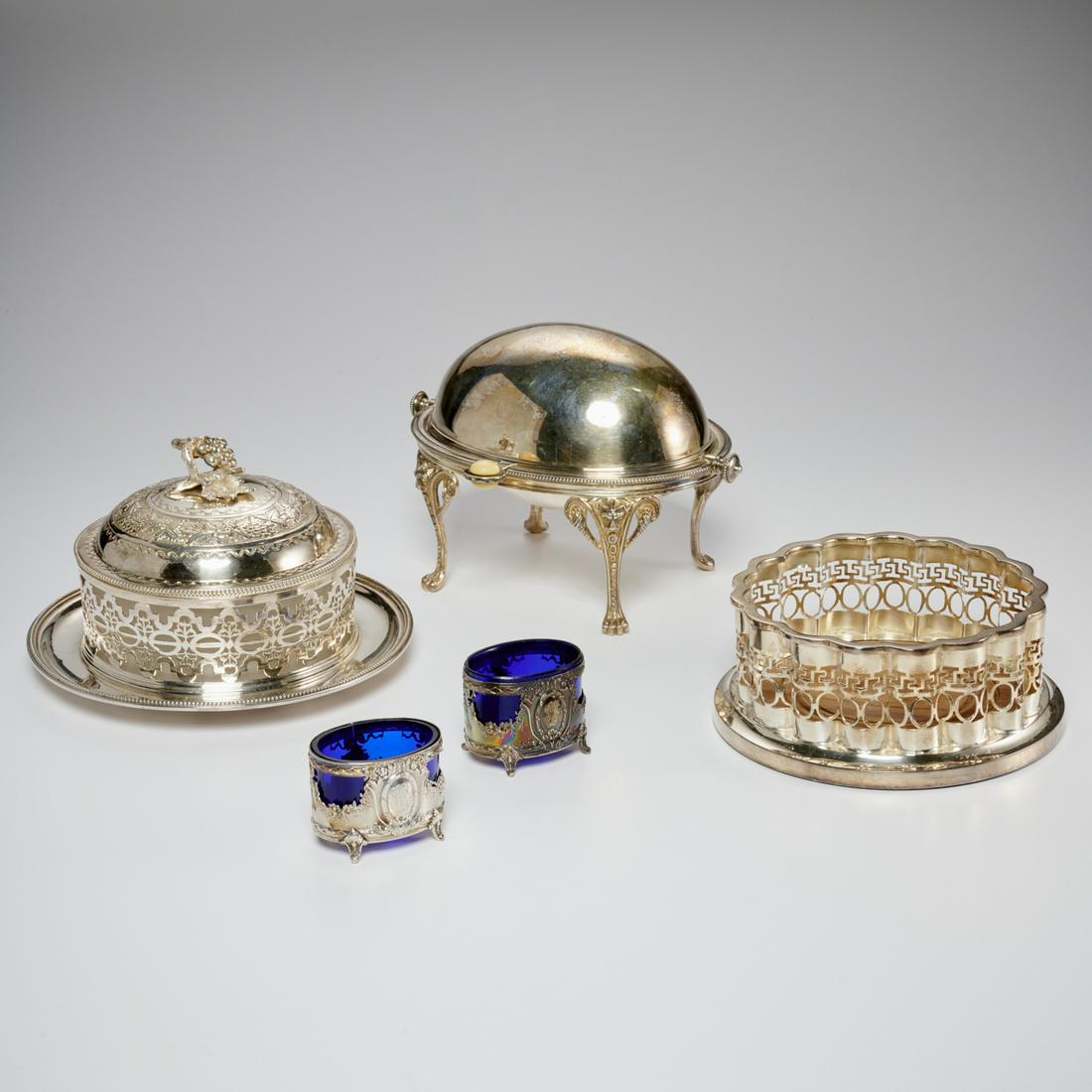 Nice group silver plated serving wares: Nice group silver plated serving wares, 19th/20th c., (5) pieces, incl. a small revolving warmer, pierced wine coaster, reticulated grape cluster butter keeper, and a pair of cobalt glass lined salts