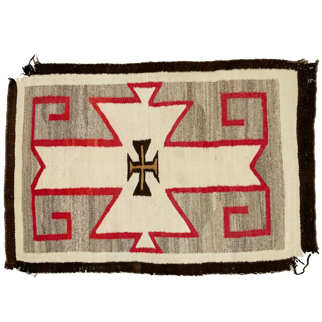 Navajo Ganado rug: Navajo Ganado rug, c. 1920s, American Southwest, red, cream, and brown decoration on gray ground, woven wool, decorated with central Maltese cross design, approx. 52.5"l x 36"w Provenance: The Collect