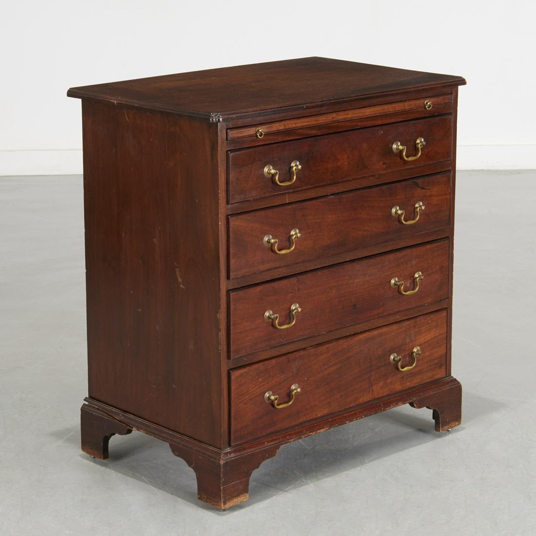 George III mahogany bachelor's chest: George III mahogany bachelor's chest, 19th c., England, rectangular top with molded edge above brush slide, and four stacked drawers on bracket feet, 30"h x 27"w x 17.5"d
