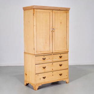 Antique American pine linen press: Antique American pine linen press, 19th c., USA, in two parts, two door cabinet, over a four drawer base, approx. 78.5"h x 42"w x 21"d