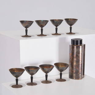 Folke Arstrom, Swedish Art Deco cocktail set: Folke Arstrom, Swedish Art Deco cocktail set, c. 1930, Sweden, silver plated brass, black Bakelite, including a cocktail shaker and (8) martini glasses, a rare full set, for Guldsmeds Aktiebolaget, im