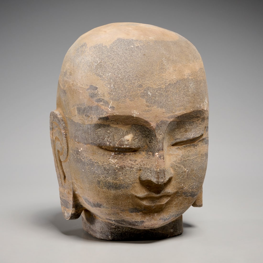 Chinese stone head of Buddhist monk: Chinese stone head of Buddhist monk, 19th/20th c., carved with serene expression, unmarked, approx. 8.5"h x 6.25"w x 6.5"d
