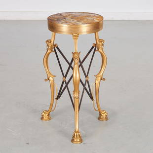 Gilbert Poillerat (after), gilt bronze gueridon: Gilbert Poillerat (after), gilt bronze gueridon, 20th c., France, round breche rose marble, inset within band gilt bronze rim, raised on three outward sweeping legs topped with a griffin head and endi