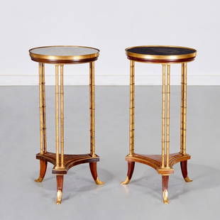 Pair Weisweiler (style) bronze gueridons: Pair Weisweiler (style) bronze gueridons, Late 19th c., France, in the Louis XVI style, after the original model by Adam Weisweiler (1744-1820), each circular gilt-bronze mounted marble top (one black