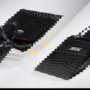 (2) Croc-embossed black handbags: (2) Croc-embossed black handbags, 20th c., Made in Italy, (1) style of Hermes Birkin, with turn key & lock, interior with gold plate engraved "Made in Italy", approx. 8.5"h, 11"w, (1) Alfa oversize en
