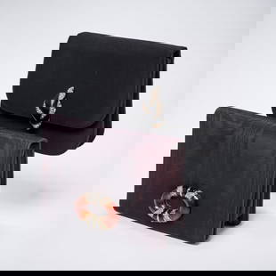 (2) Martin Van Schaak evening bags: (2) Martin Van Schaak evening bags, 2000s, (1) black hombre ribbed satin with black/brown enameled ornament with pave rhinestones, interior zipper pocket, change purse, 5"h, 7"w, (1) fine rib black si
