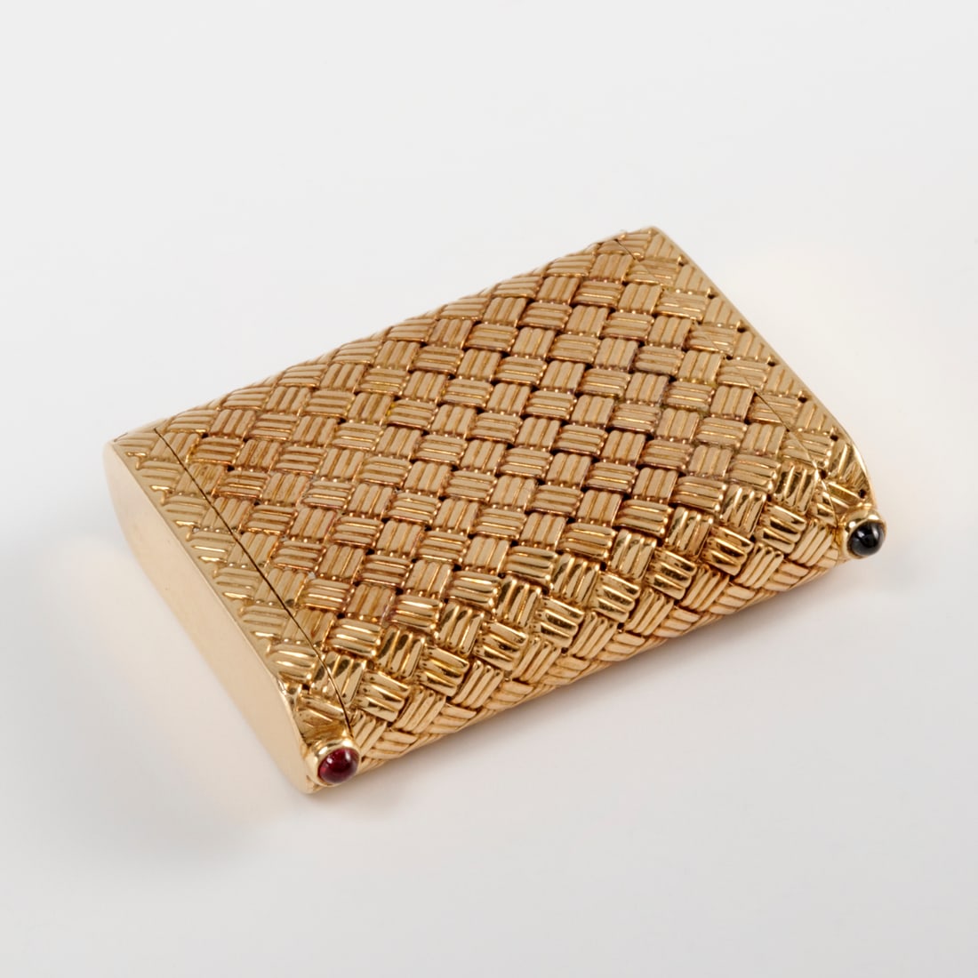 Tiffany & Co. 14k gold pill box: Tiffany & Co. 14k gold pill box, 20th c., basket weave yellow gold with dual compartment, hinged lids on each end accented with cabochons, stamped 14KT Tiffany, approx. 1.25"h, 3/8"W, 13.13 dwt Proven