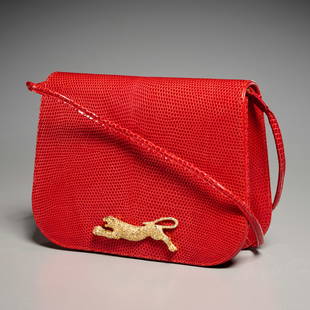 Martin Van Schaak red leather evening bag: Martin Van Schaak red leather evening bag, 20th c., flap closure with removable shoulder strap, figural gold panther medallion, smooth leather interior with slat pockets, change purse, approx. 5.5"h,