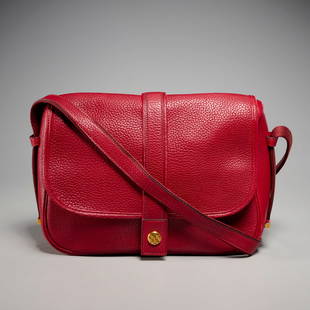 Vintage Hermes red shoulder handbag: Vintage Hermes red shoulder handbag, 1980s, Made in France, pebbled leather single flap, with strap detail and H logo medallion snap, interior stamped in gold "Hermes Paris Made in France", (3) compar