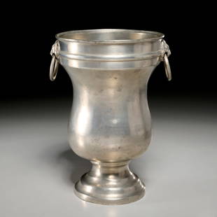 Christian Dior, pewter wine bucket: Christian Dior, pewter wine bucket, Mid-20th c., Belgium, baluster form with lion mask and ring handles, stamped "Made in Belgium for Christian Dior", 11"h x 8"dia Provenance: A Michael Greer