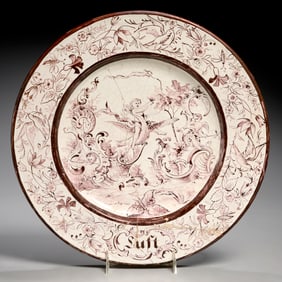 Continental manganese decorated faience charger