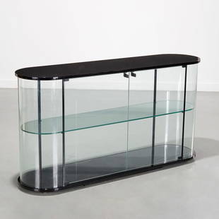 Pace / Fiam Italia display cabinet: Pace / Fiam Italia display cabinet, Designed 1987, Vittorio Livi for Fiam Italia, black lacquered and curved glass cabinet, marked "Fiam" on glass front at lower right, 32"h x 60"w x 15.75"d