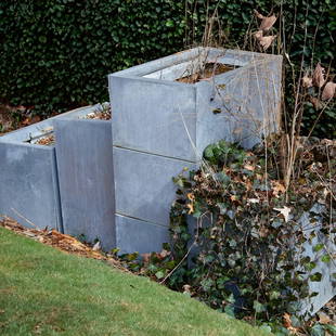 (6) Custom Modernist zinc planters: (6) Custom Modernist zinc planters, 20th c., USA, zinc sheet metal over wood, sizes range from approx. 28"h x27"w x 17"d (tallest), 13"h x 29.75"w x 18.25"d (shortest) Provenance: A Daniel Romualdez C