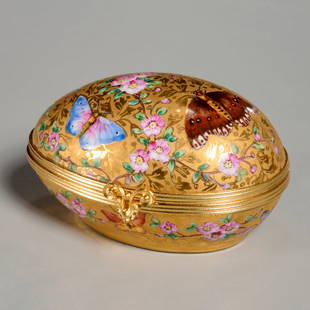 Le Tallec gilt and painted porcelain trinket box: Le Tallec gilt and painted porcelain trinket box, 20th c., France, egg form hinged porcelain box, signed "Le Tallec" and "Plummer - McCutcheon" with artist's initials to underside, 2.25"h x 3.75"l x