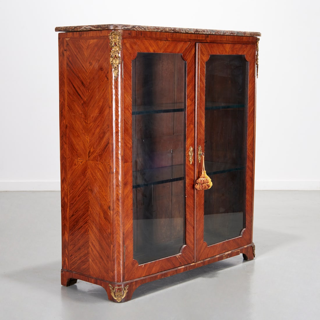 Louis XVI marble top bibliotheque, signed: Louis XVI marble top bibliotheque, signed, c. 1750, France, stamped "H. HANSEN" (Hubert Hansen maitre en 1757), Indian rosewood, ormolu mounts, the rectangular rose breche marble top over pair of hing