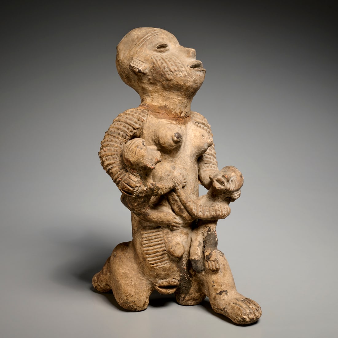 Djenne Peoples, terracotta maternity figure (1 of 6)