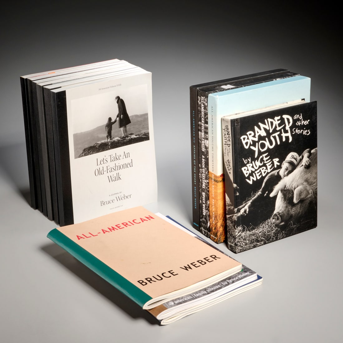 Bruce Weber, (13) vols. photography, three signed: Bruce Weber, (13) vols. photography, three signed, Bruce Weber (American, b. 1946), incl. (11) vols. of the All-American series: 1, 3, 4, 6, 7, 11, 12, 13, 14, 16, 17, 23 with Family Albums inscribed