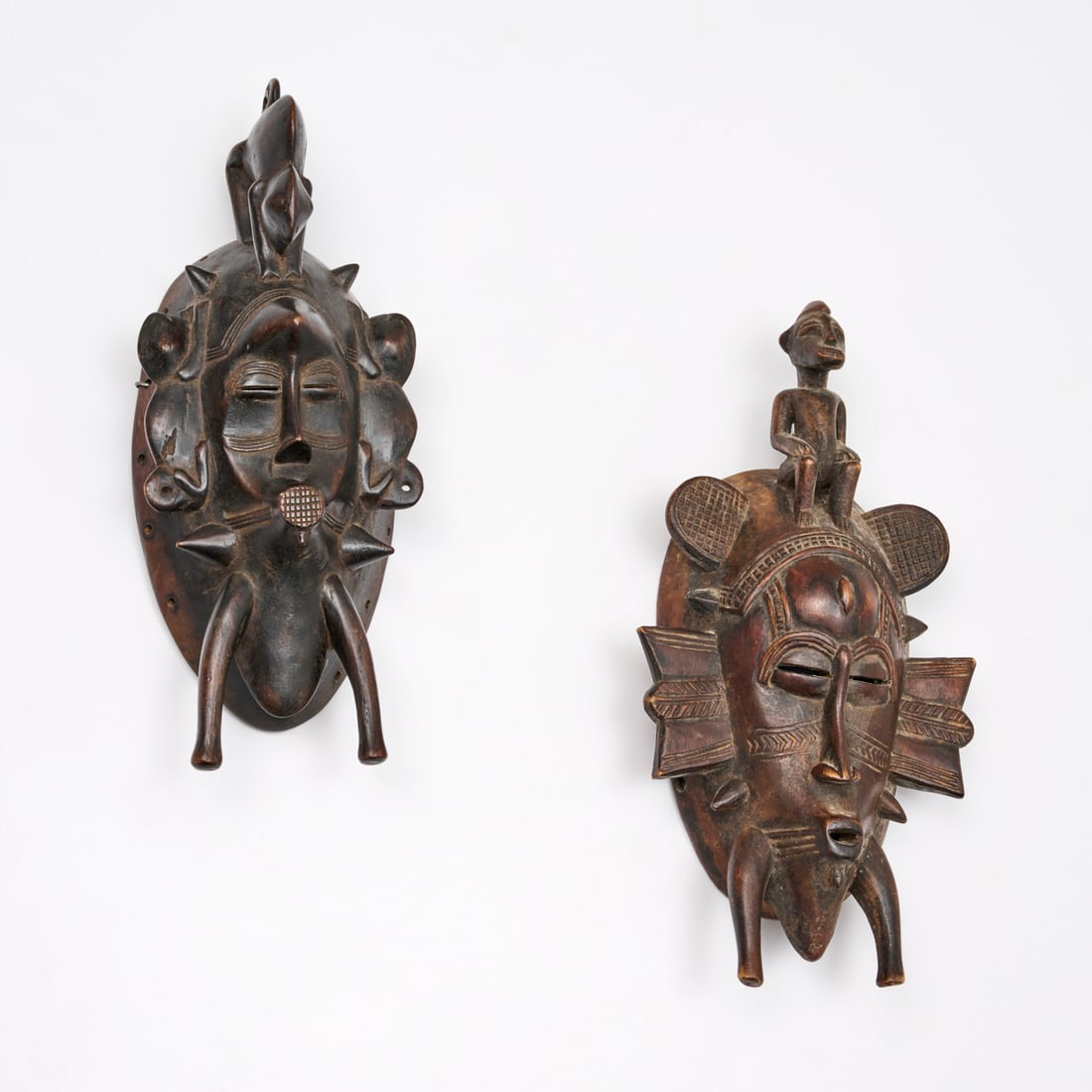 Senufo People, (2) carved wood masks (1 of 7)