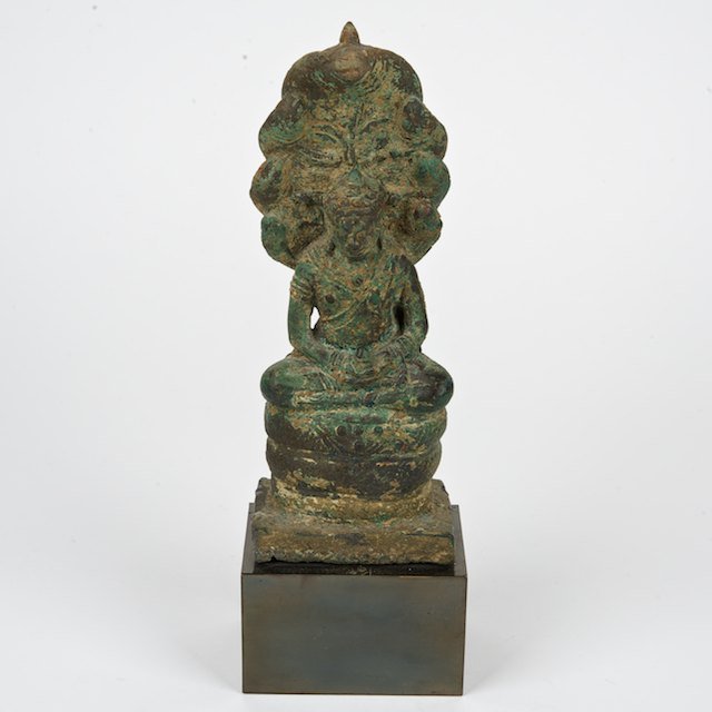 Southeast Asian figure of seated Buddha: Southeast Asian figure of seated Buddha: Prob. 18th c., on laminate base, 8.25"h x 3"w x 2"d (excl. base) - Condition Report: overall fair, verdigris patina, pitting