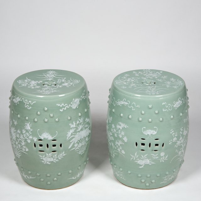 Pair Chinese celadon porcelain garden seats: Pair Chinese celadon porcelain garden seats: Late Qing Dynasty, white slip decoration, 19"h x 14"dia. - Condition Report: overall good, glaze scratches, no significant damage or repairs observed - Pro