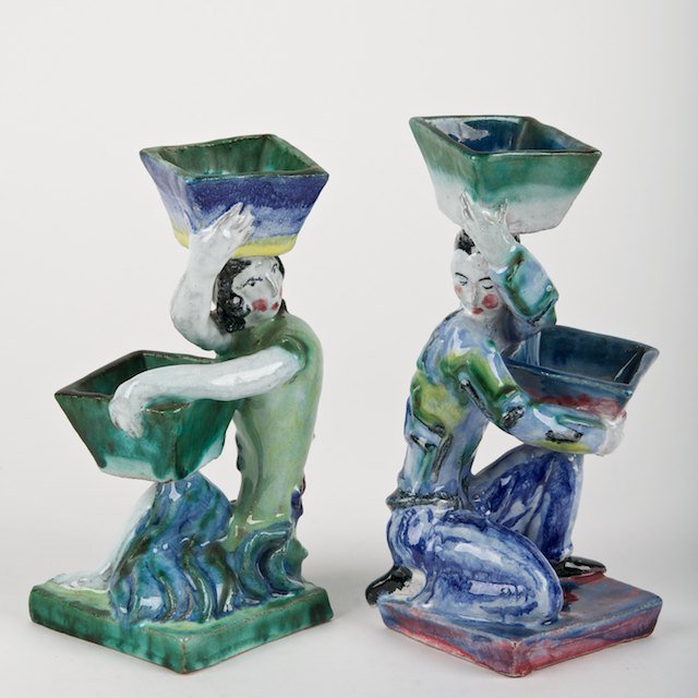 Pair Ena Kopriva Wiener Werkstatte pottery figure: Pair Ena Kopriva Wiener Werkstatte pottery figures: Circa 1910, nos. 213 &214, impressed factory marks, 6.75"h x 3.5"w x 3"d - Condition Report: overall good/fair, a few chips to basket corners, no si