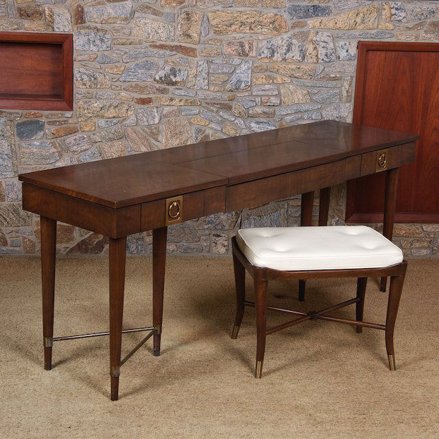 Walnut and brass vanity and bench by John Stuart: Walnut and brass vanity and bench by John Stuart: Mid 20th c., 29"h x 72"l x 19.5"d (vanity), 18"h x 23"l x 16"d (bench) - Condition Report: overall fair, general finish distress commensurate with age