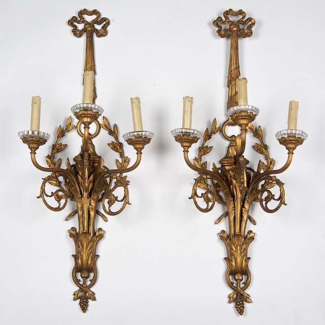Pair French gilt bronze sconces with Baccarat bob: Pair French gilt bronze sconces with Baccarat bobeche: First quarter 20th c., 36"h x 15"w x 10.5"d - Condition Report: overall good/fair, evidence of age and handling, gilding rubbed, prisms lacking, 