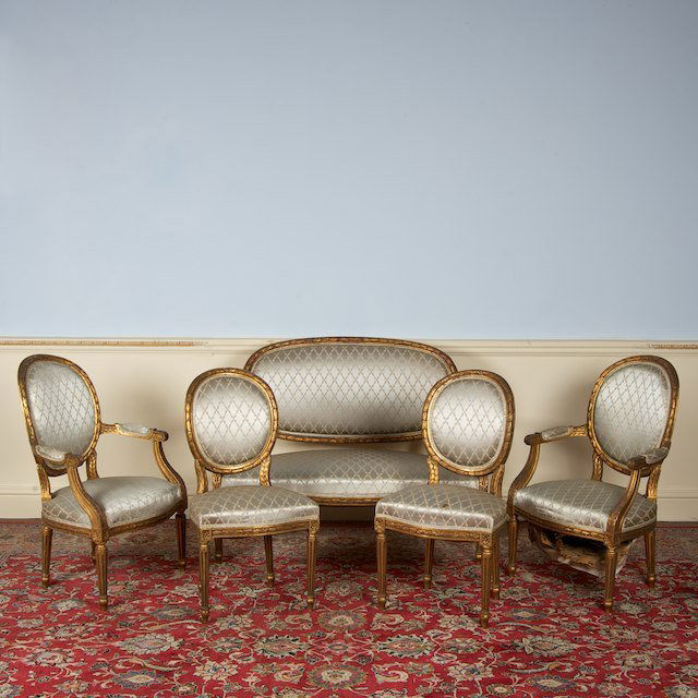 Louis XVI style (5)-piece giltwood salon suite: Louis XVI style (5)-piece giltwood salon suite: First quarter 20th c., comprising: (1) canape; (2) fauteuils and (2) chaises, 37"h x 48"l x x24"d (canape), 37"h x 24"w x 18"d (fauteuils) - Condition R