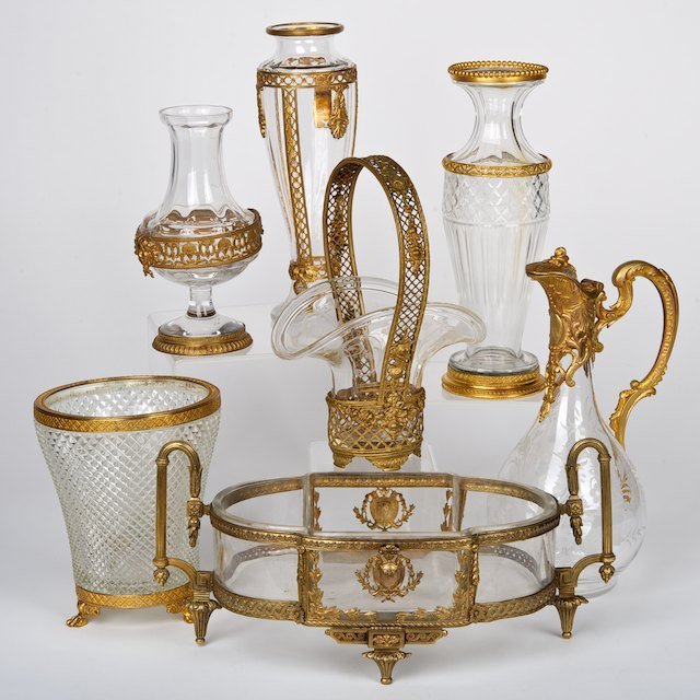 (7) pieces Baccarat style ormolu mounted glass: (7) pieces Baccarat style ormolu mounted glass : 19th/20th c., incl. a ewer, assorted vases and centerpiece, largest: 6"h x 13"l - Condition Report: overall good, gilding rubbed, no damage or repairs 