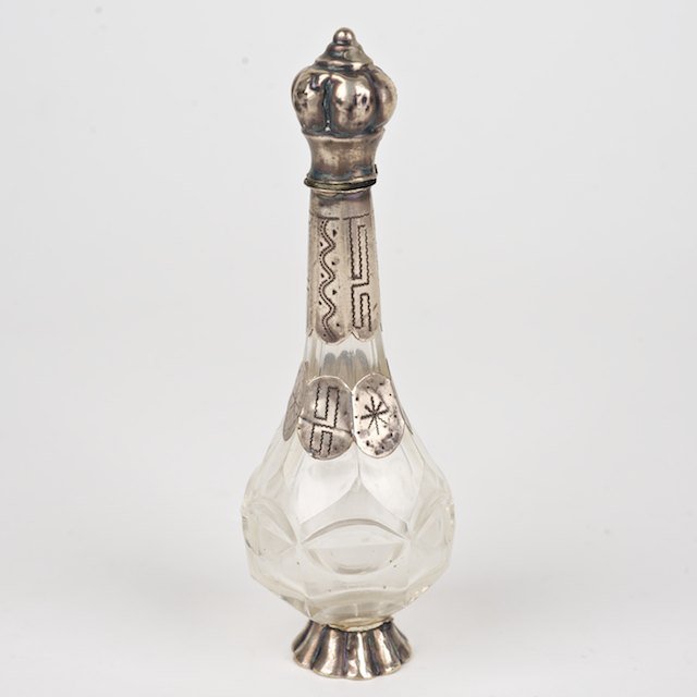 Antique Islamic silver mounted glass rose water b: Antique Islamic silver mounted glass rose water bottle: 18th/19th c., 5"h x 1.75"dia. - Condition Report: overall fair, interior stopper lacking, small dents to cap and foot, polish wear